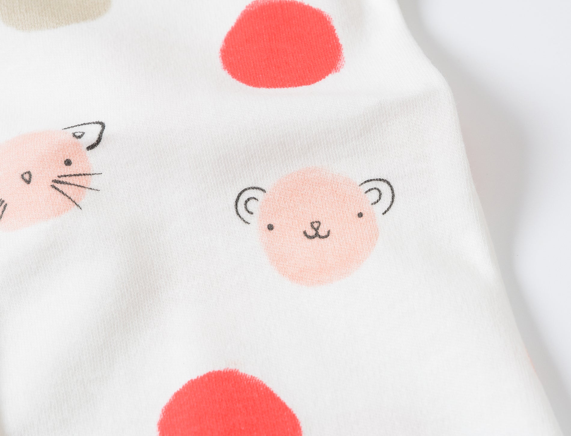 footed romper dots and animals at titchytastic.com
