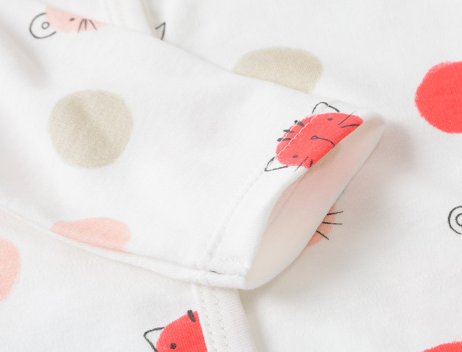 footed romper dots and animals at titchytastic.com